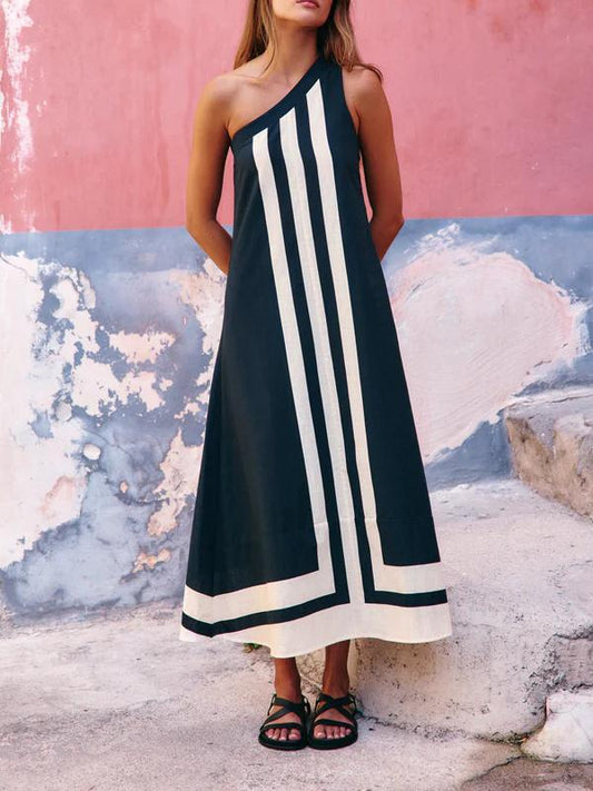 Asymmetrical Midi Dress – Zomerse Elegantie in Beweging