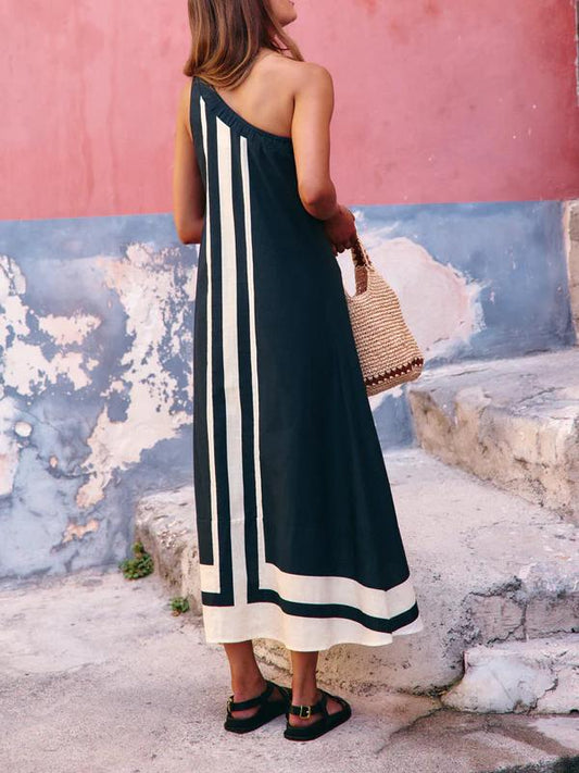 Asymmetrical Midi Dress – Zomerse Elegantie in Beweging